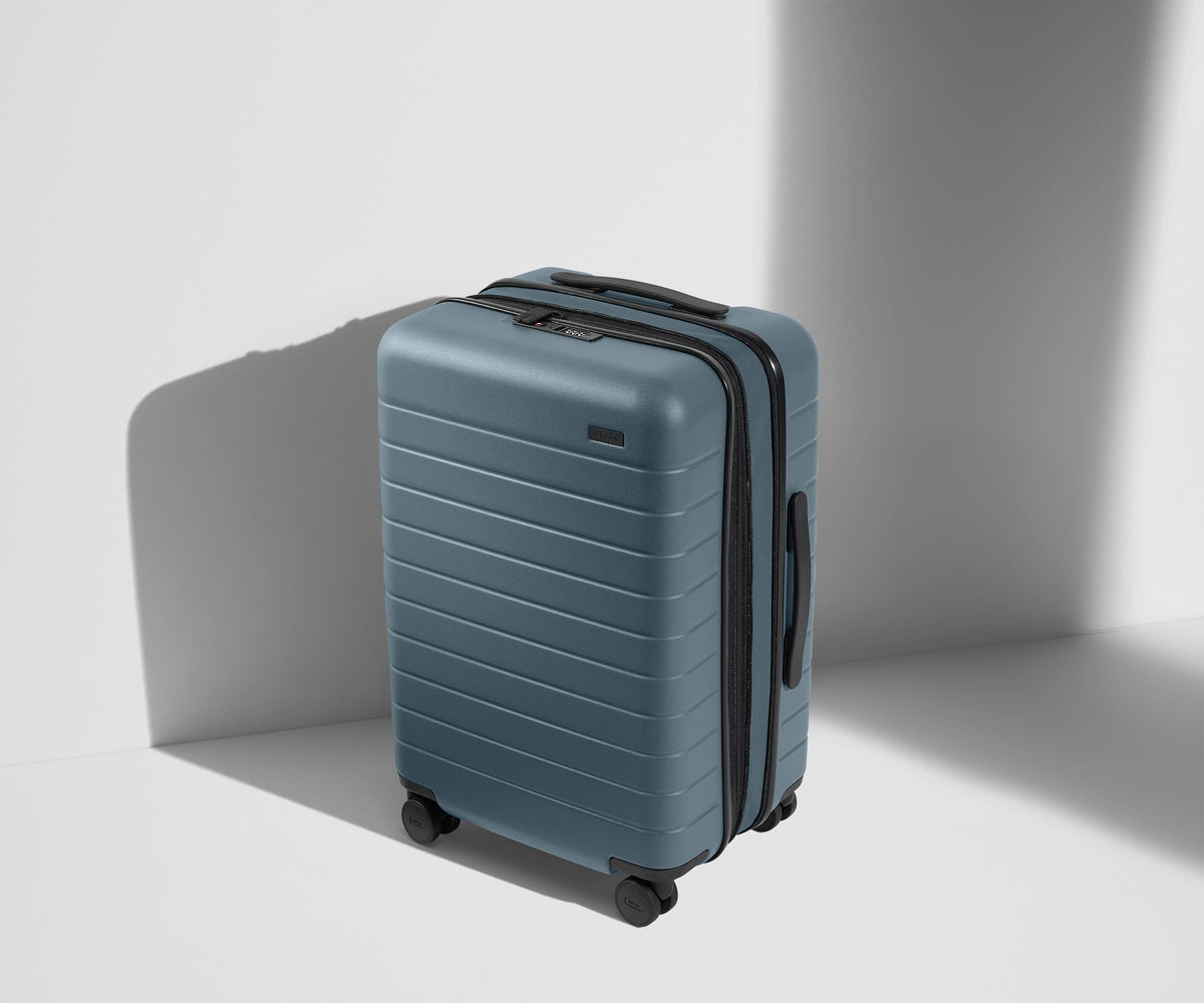 Away The Bigger Carry-On Flex Suitcase - Coast Blue