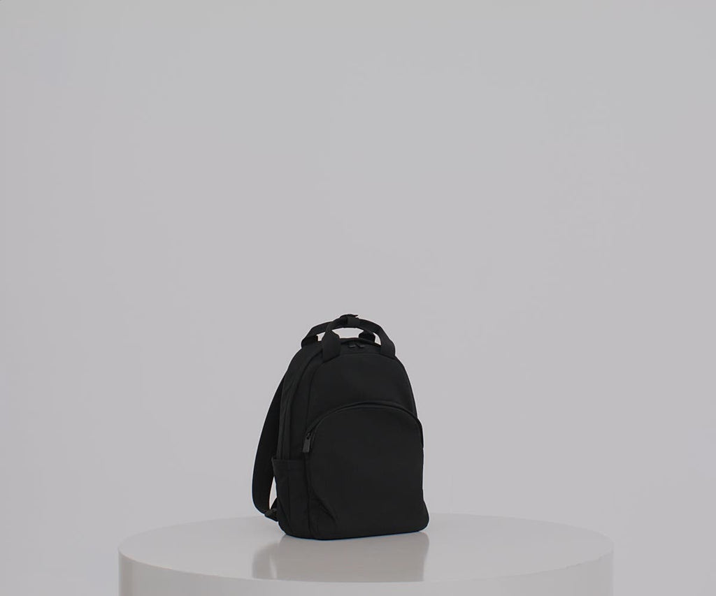 Away Featherlight Backpack in Clay Pink