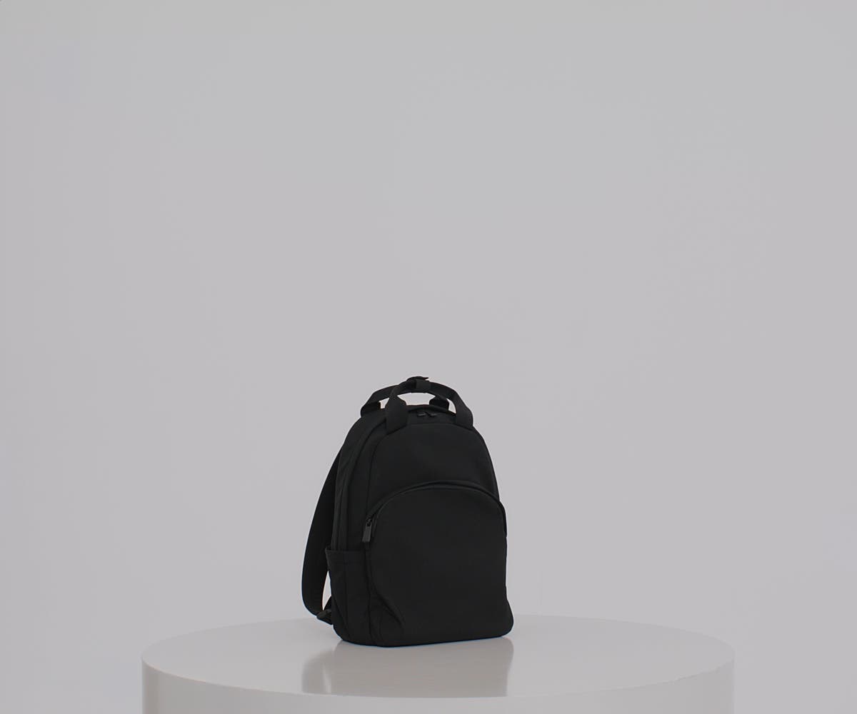 Away Featherlight Backpack in Clay Pink