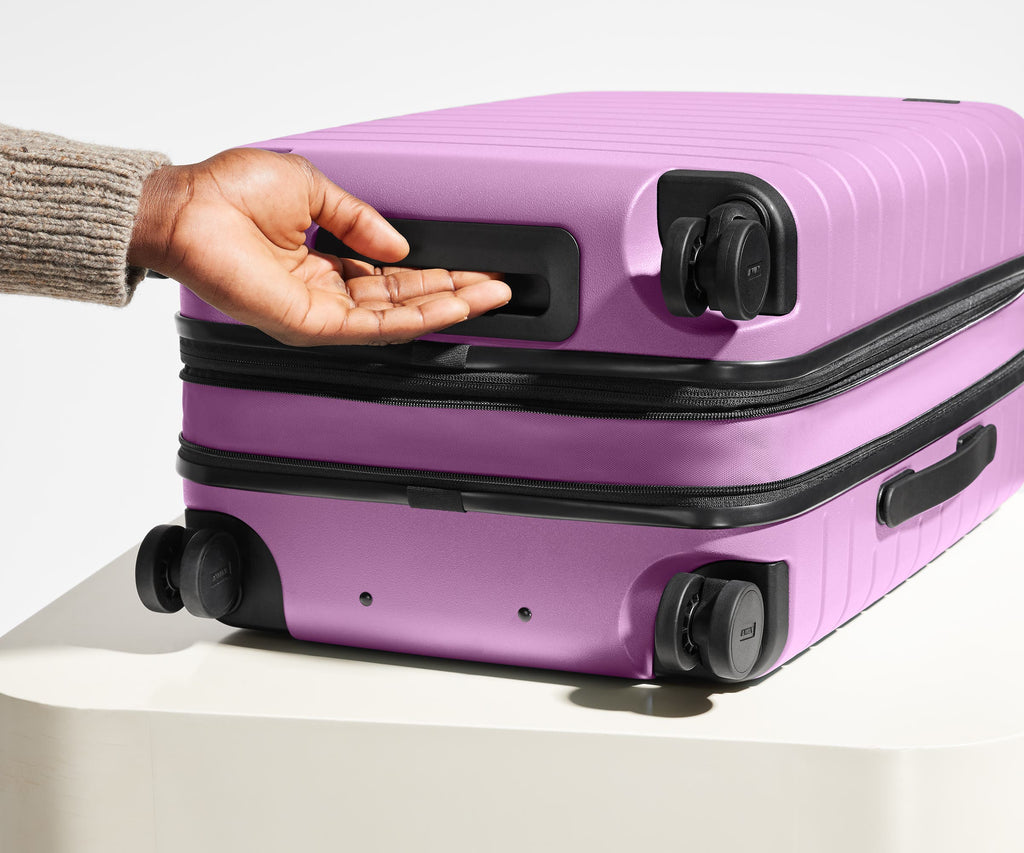 Away The Bigger Carry-On Flex Suitcase - Taffy Purple