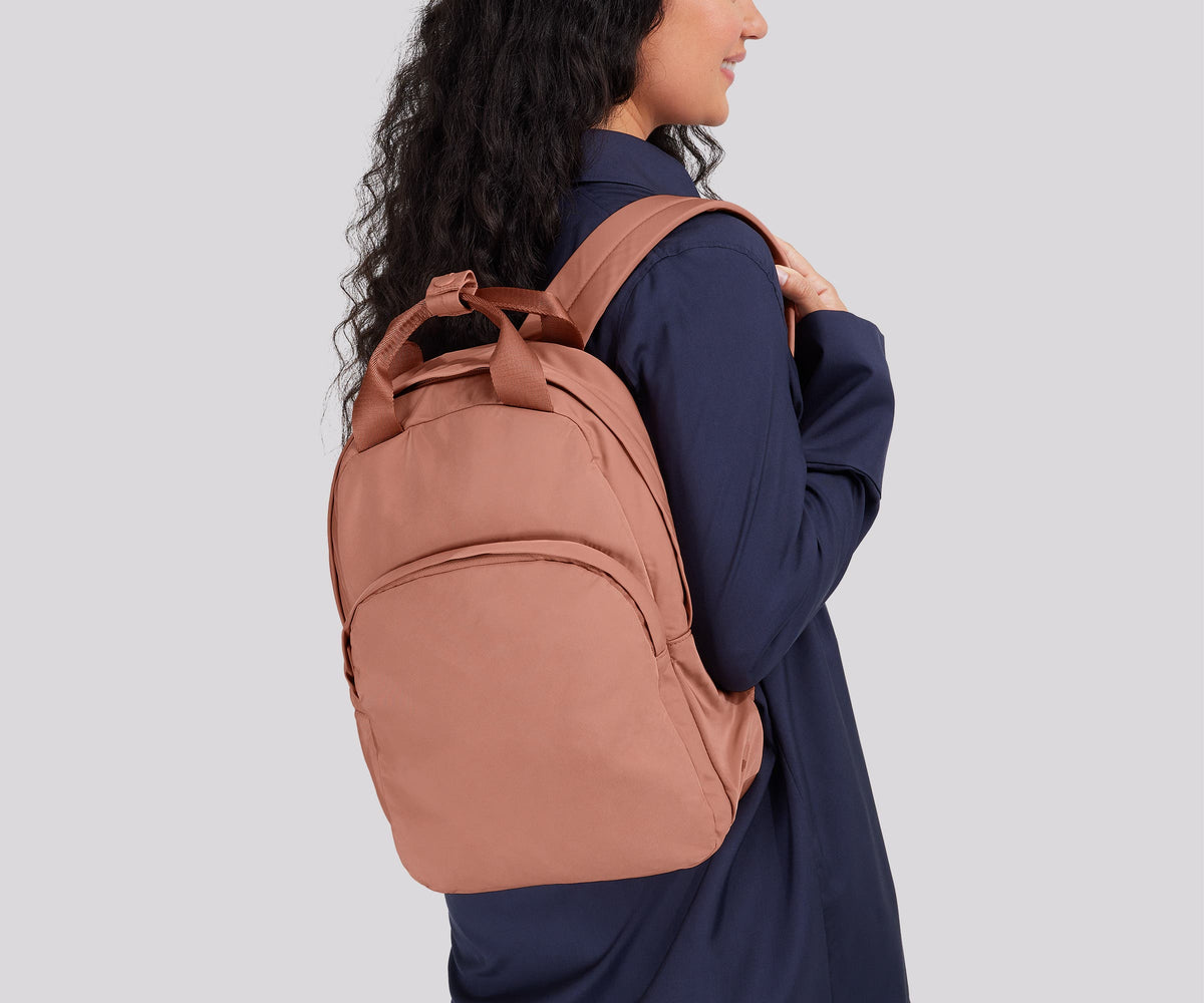 Away Featherlight Backpack in Clay Pink