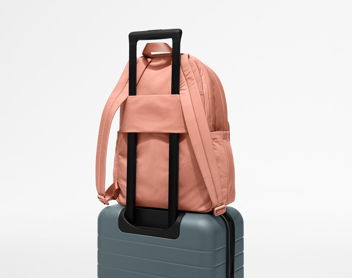 Away Large Featherlight Backpack in Clay Pink
