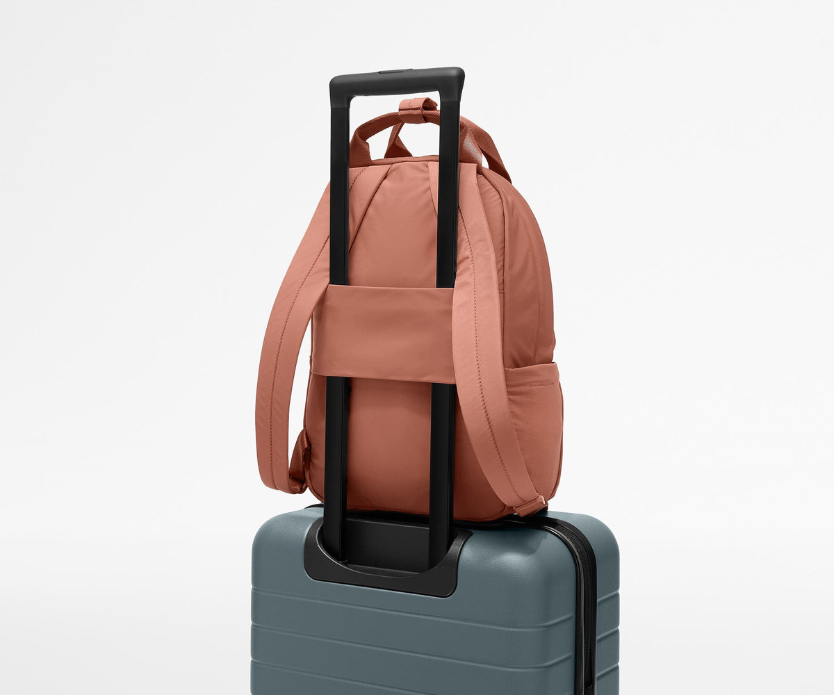 Away Featherlight Backpack in Clay Pink