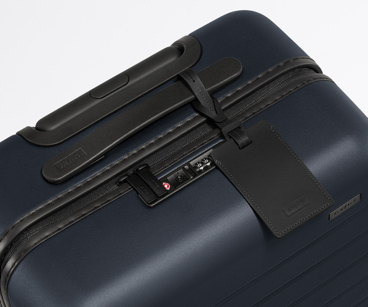 Away The Collegiate Bigger Carry-On Suitcase - University of Michigan ™