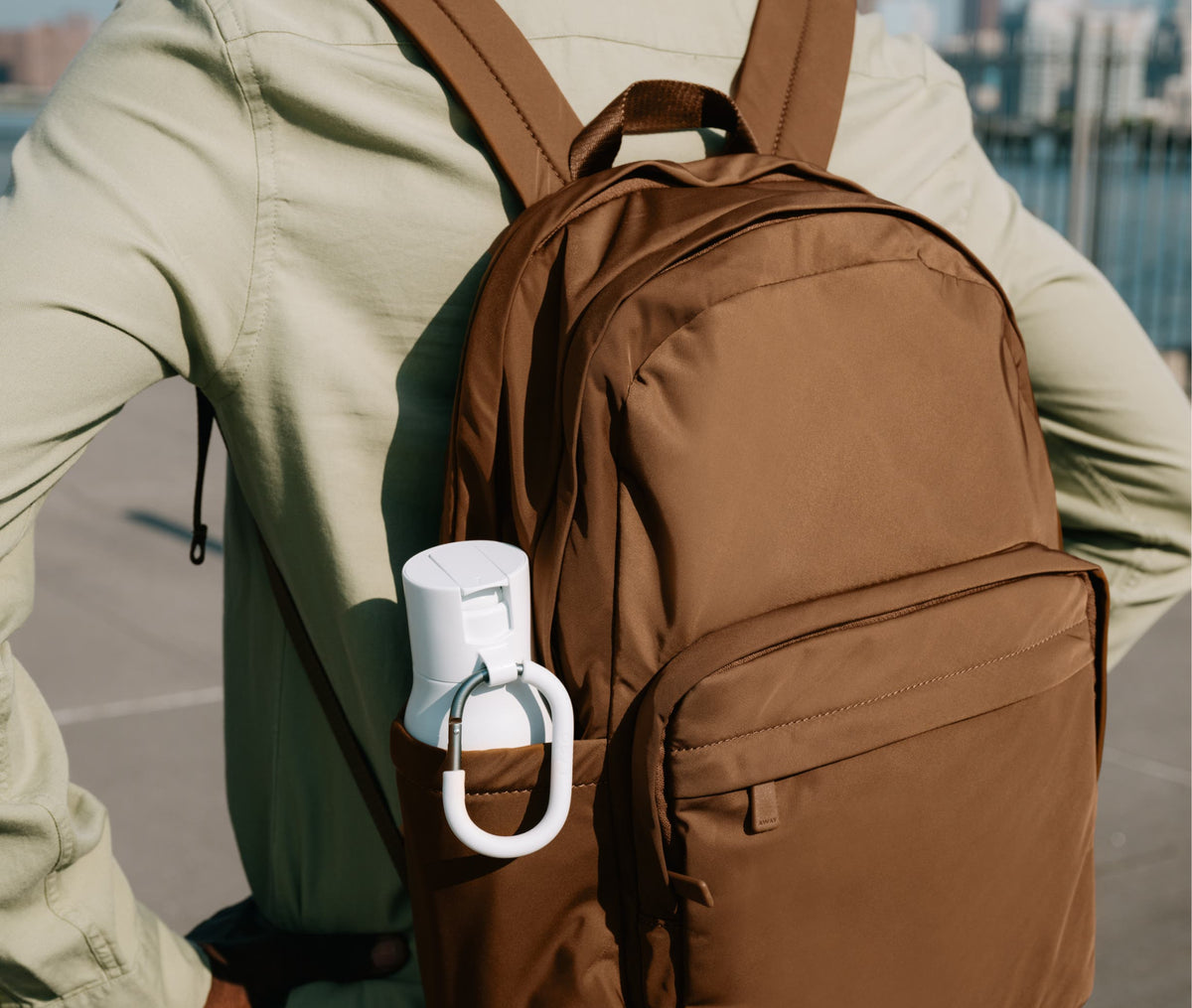 Away Large Featherlight Backpack in Clay Pink