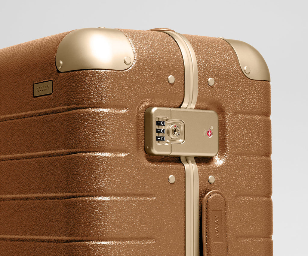 Away The Aluminum Edge Bigger Carry-On Suitcase - Cognac Brown