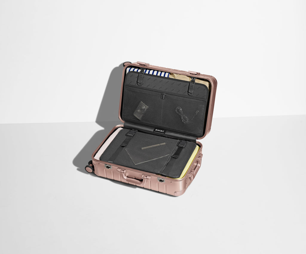 Away The Bigger Carry-On: Aluminum Edition Suitcase - Rose Gold (with USB charger)