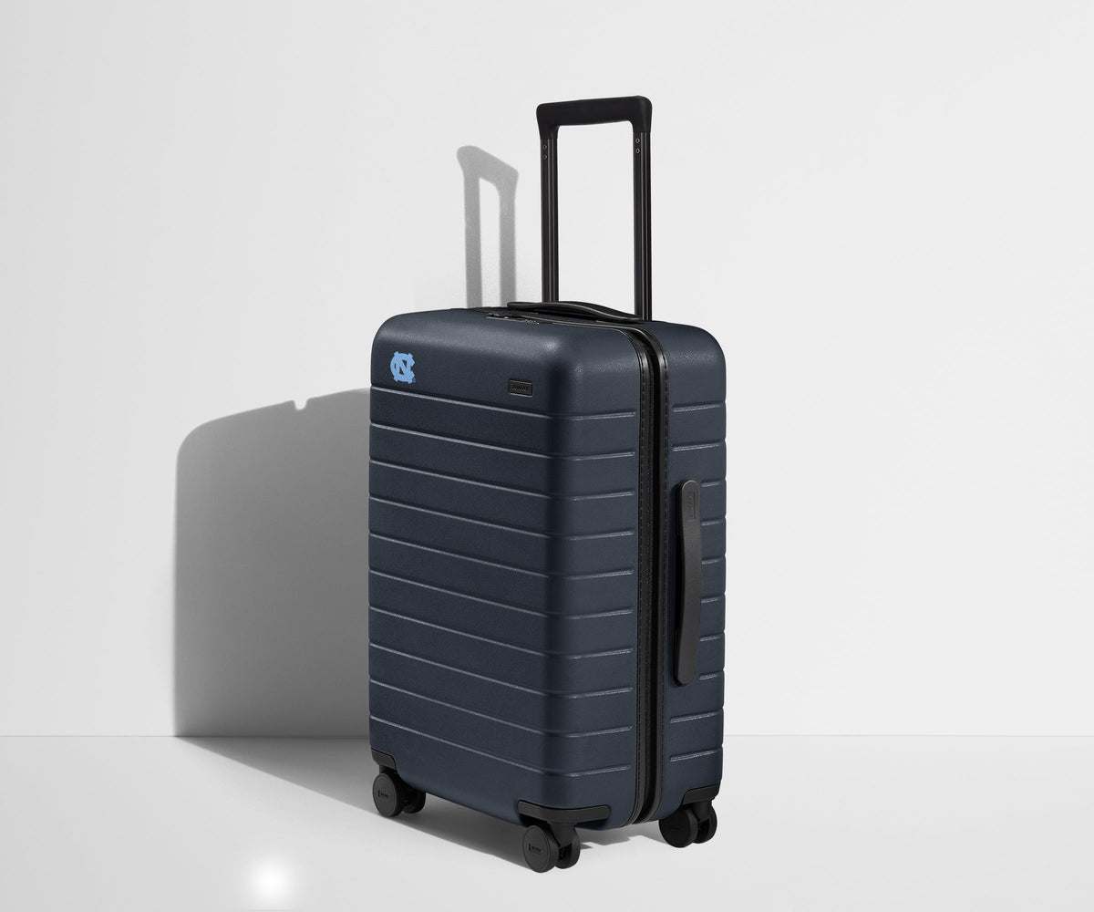 Away The Collegiate Bigger Carry-On Suitcase - University of North Carolina ®