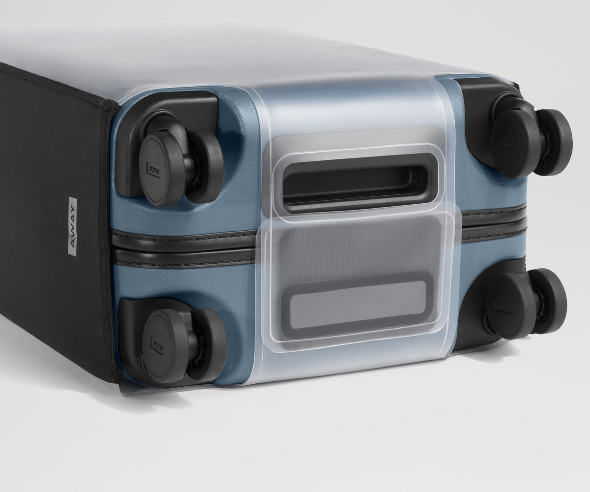 Away Clear Luggage Cover Suitcase - The Bigger Carry-On
