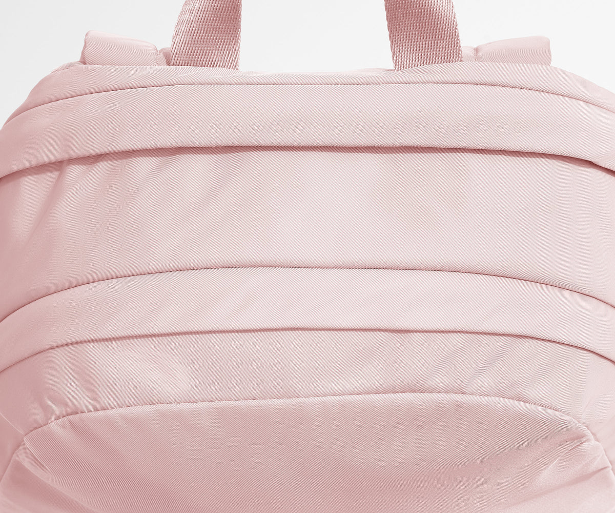 Away Large Featherlight Backpack in Blush Pink