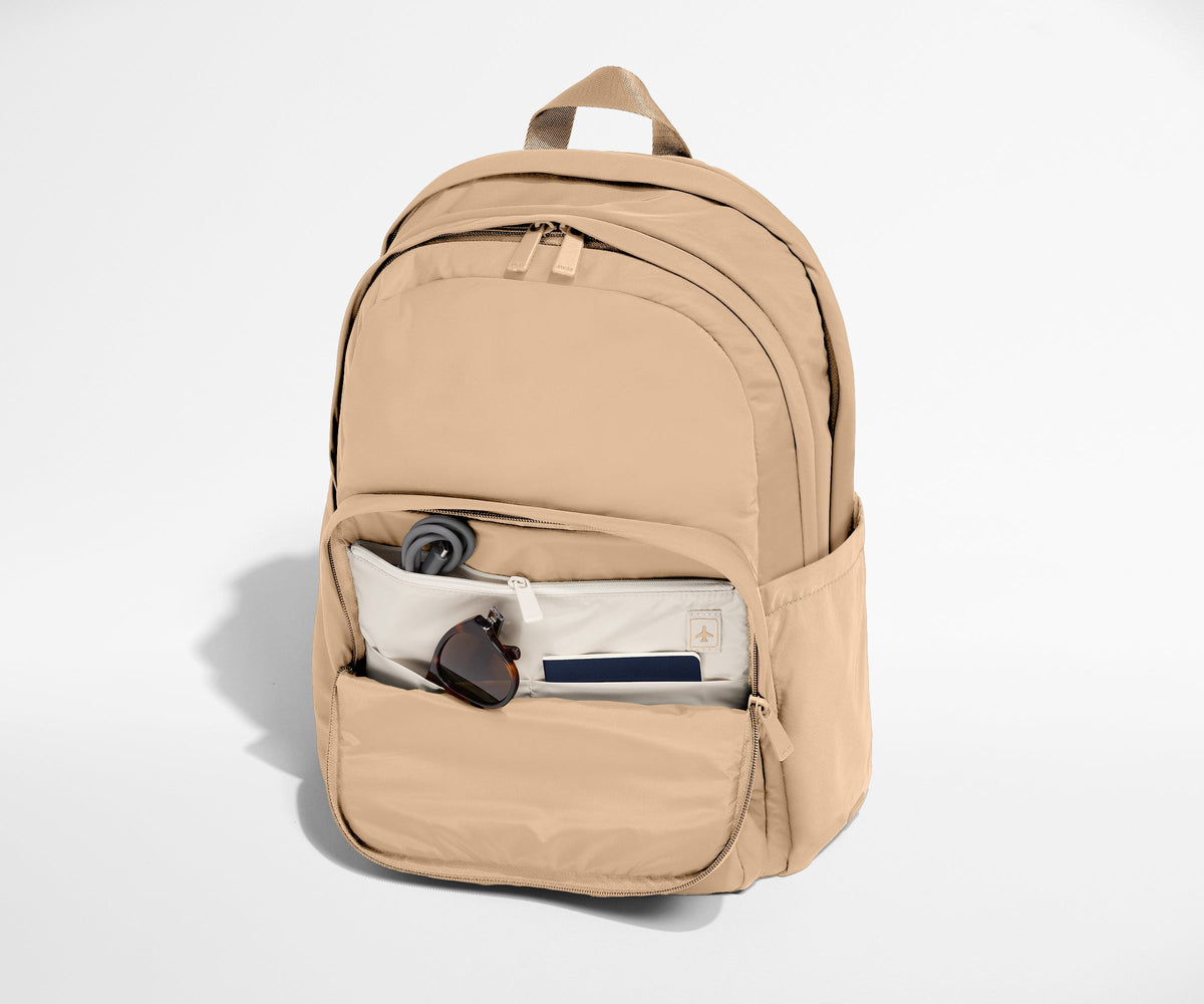 Away Large Featherlight Backpack in Camel Brown