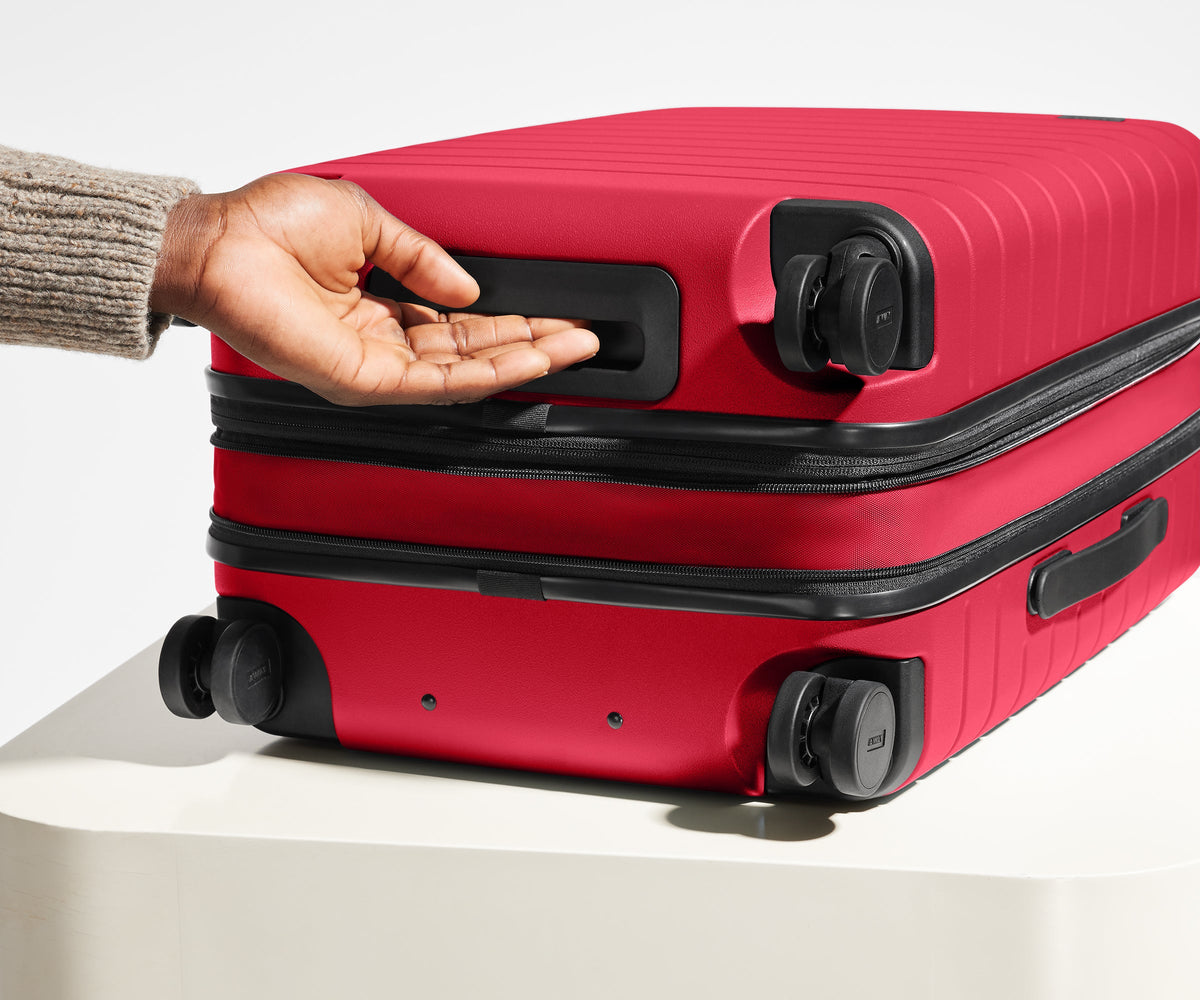 Away The Bigger Carry-On Flex Suitcase - Cherry Red
