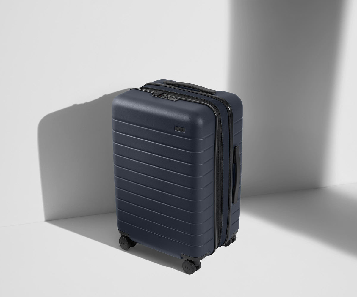 Away The Bigger Carry-On Flex Suitcase - Navy Blue