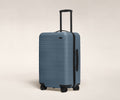 Away The Original Bigger Carry-On Suitcase - Coast Blue