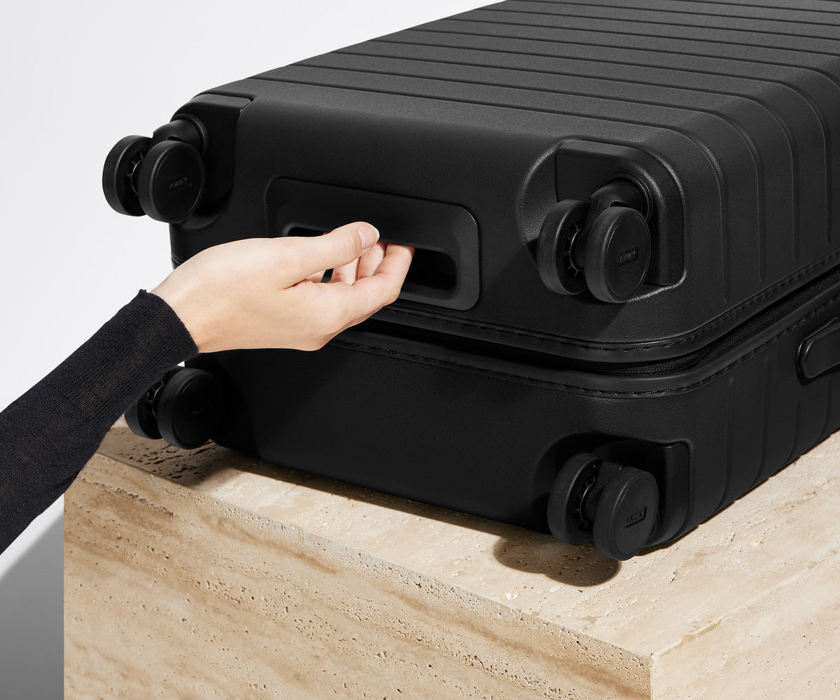 Away The Collegiate Bigger Carry-On Suitcase - The University of Texas