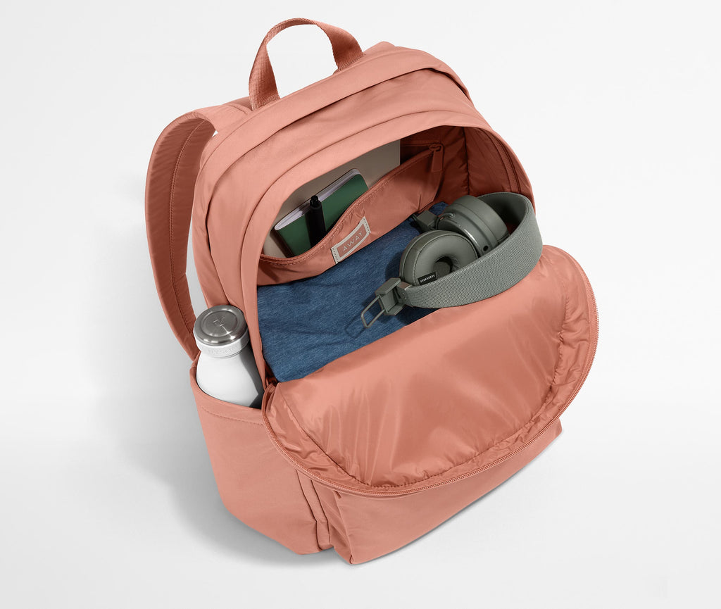 Away Large Featherlight Backpack in Clay Pink