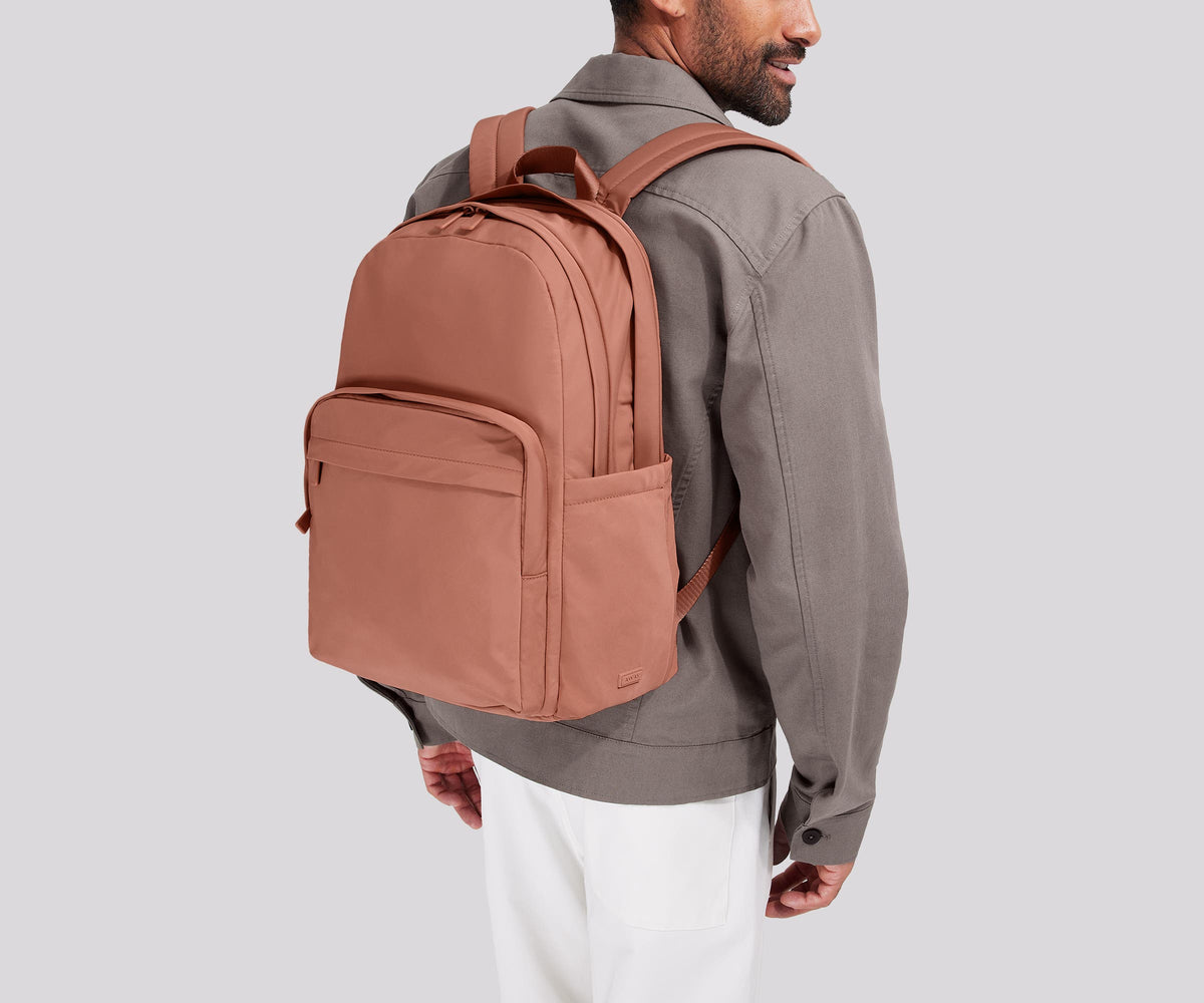 Away Large Featherlight Backpack in Clay Pink