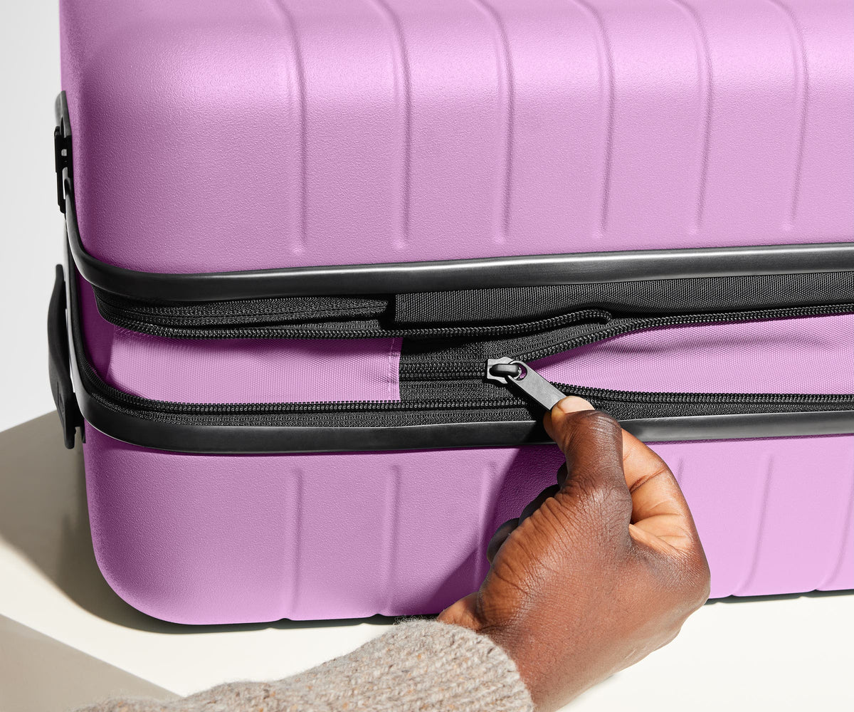 Away The Bigger Carry-On Flex Suitcase - Taffy Purple