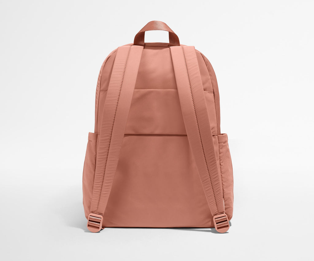 Away Large Featherlight Backpack in Clay Pink