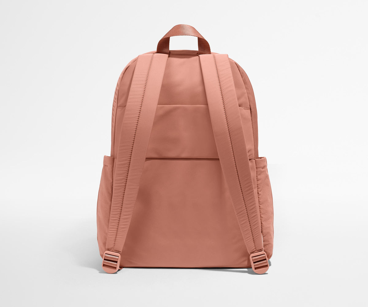 Away Large Featherlight Backpack in Clay Pink