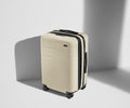 Away The Bigger Carry-On Flex Suitcase - Salt White (Gloss)