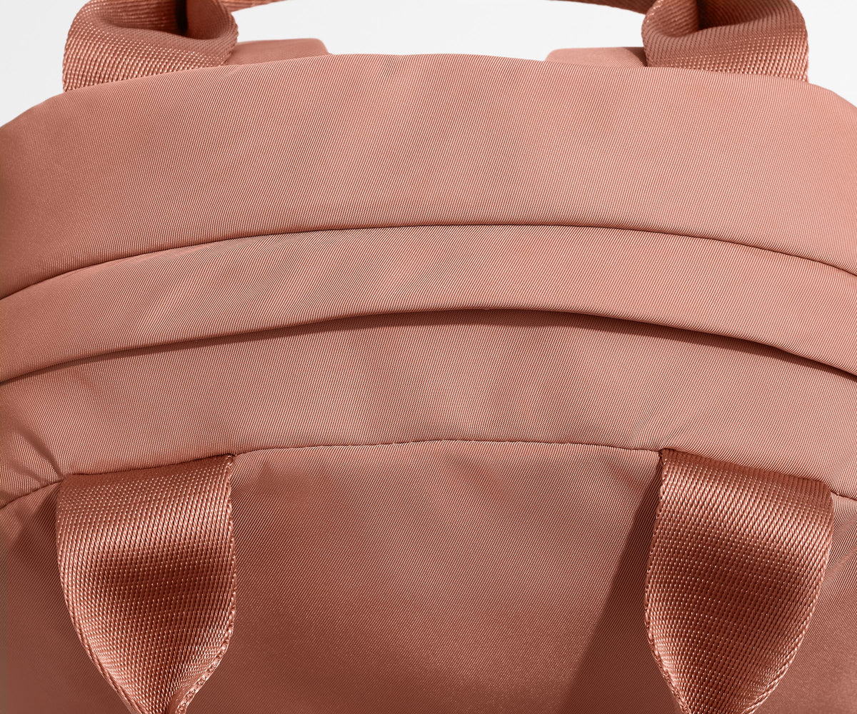 Away Featherlight Backpack in Clay Pink